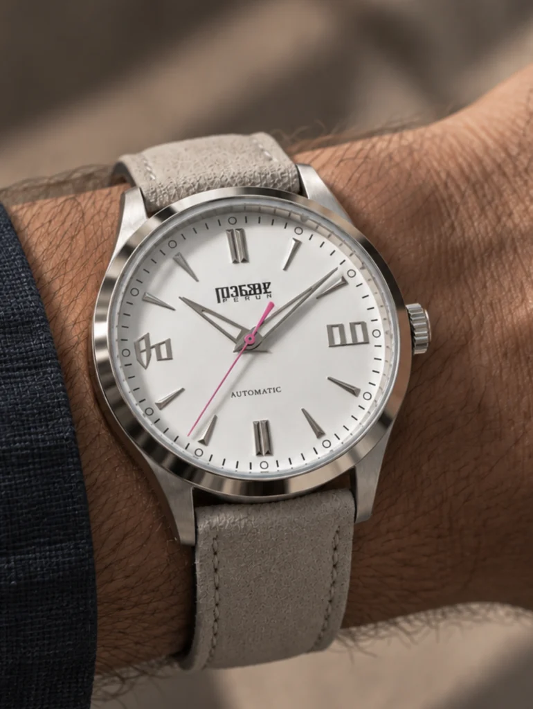 Knez Zora on the wrist, on a light grey suede strap