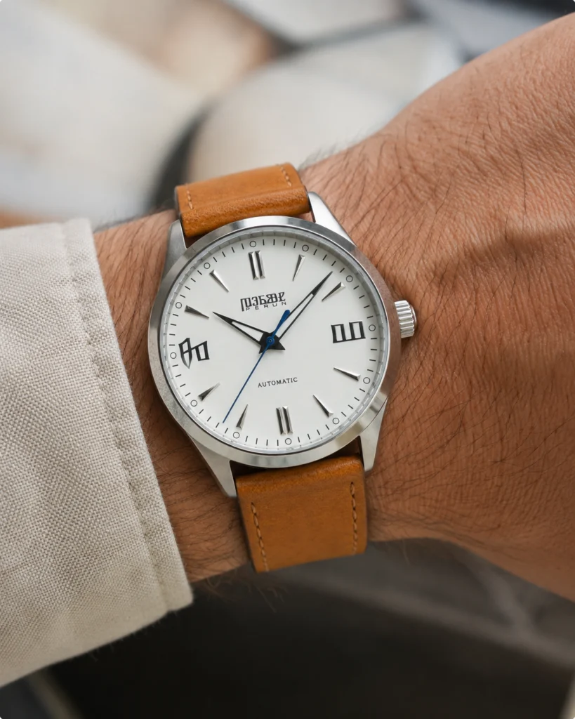 Knez Mraz on the wrist, on a matte cognac leather strap